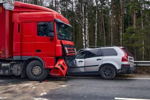 Lewes, DE – Injuries Reported in Car-Tractor Trailer Crash at Midway Outlet Dr and Coastal Hwy