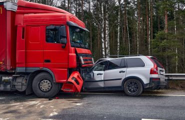 Lewes, DE – Injuries Reported in Car-Tractor Trailer Crash at Midway Outlet Dr and Coastal Hwy